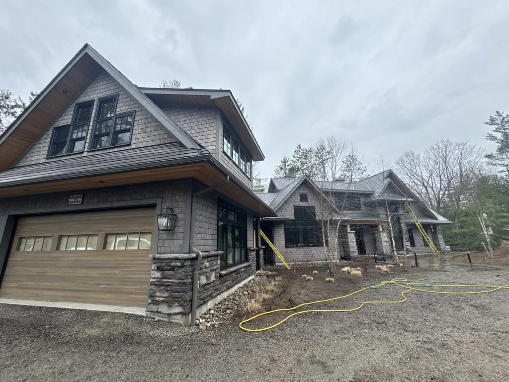 Cottage exterior after professional gutter cleaning in the region